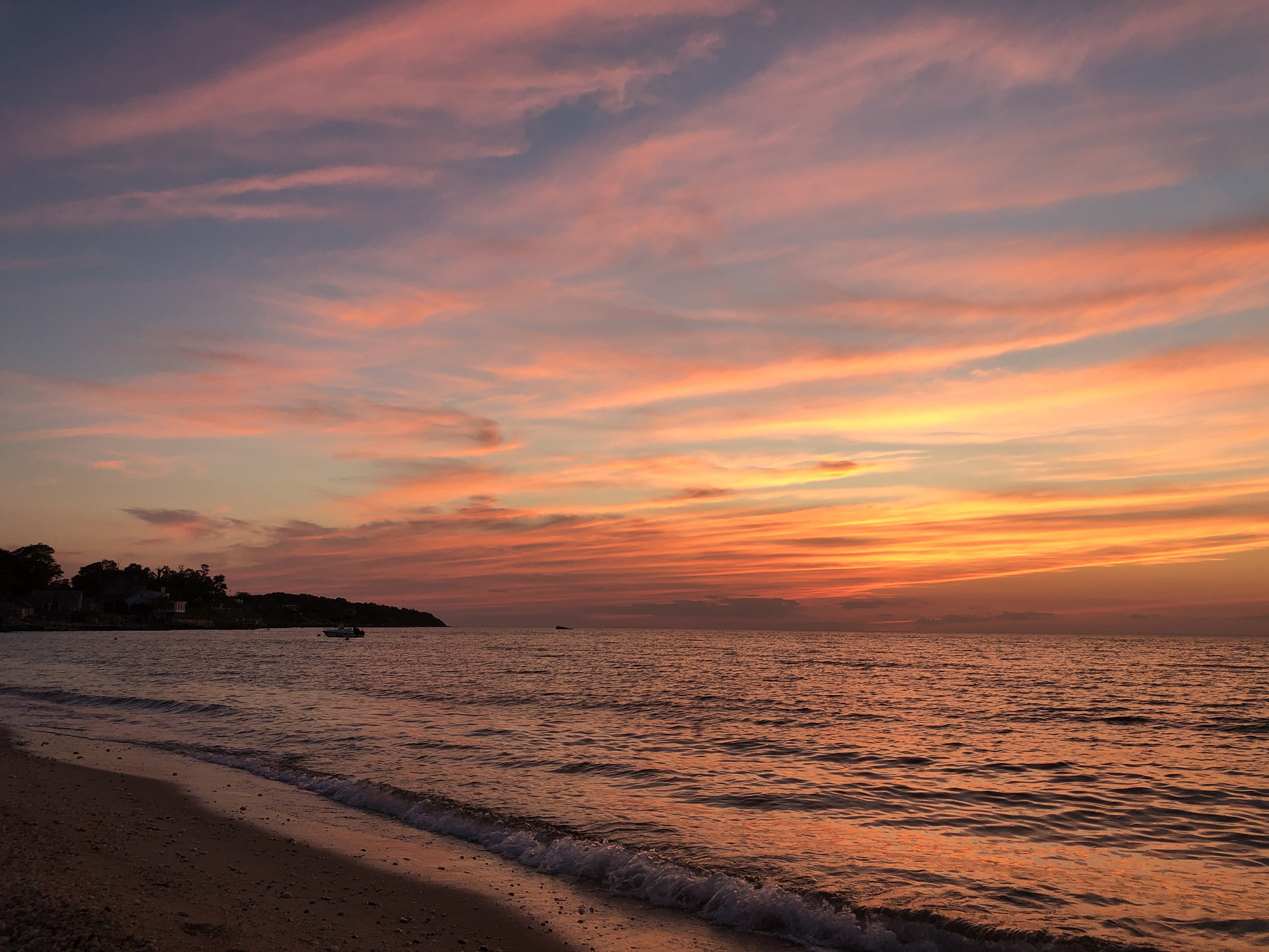Dramatic sunset at Town Beach, Southold, Long Island, New York